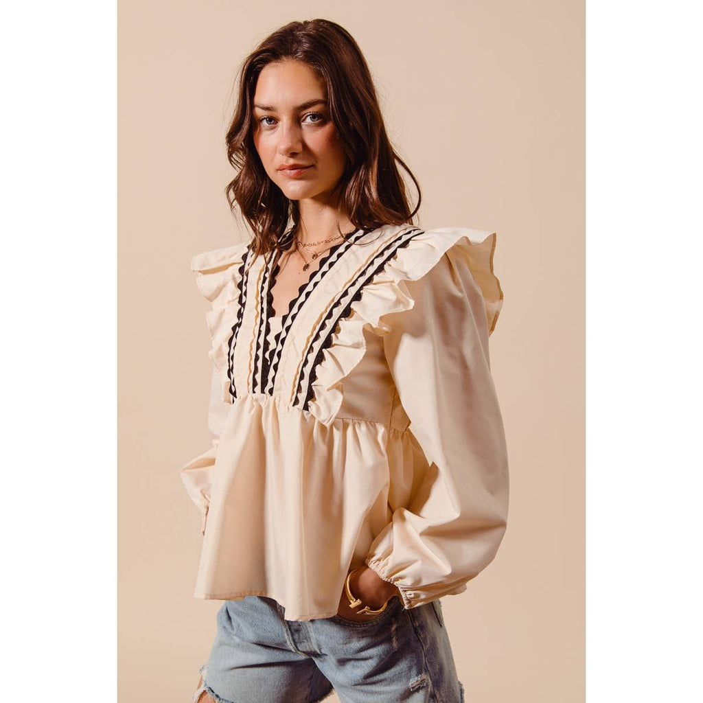 SOLID WOVEN LONG SLEEVE TOP WITH WAVE TRIM